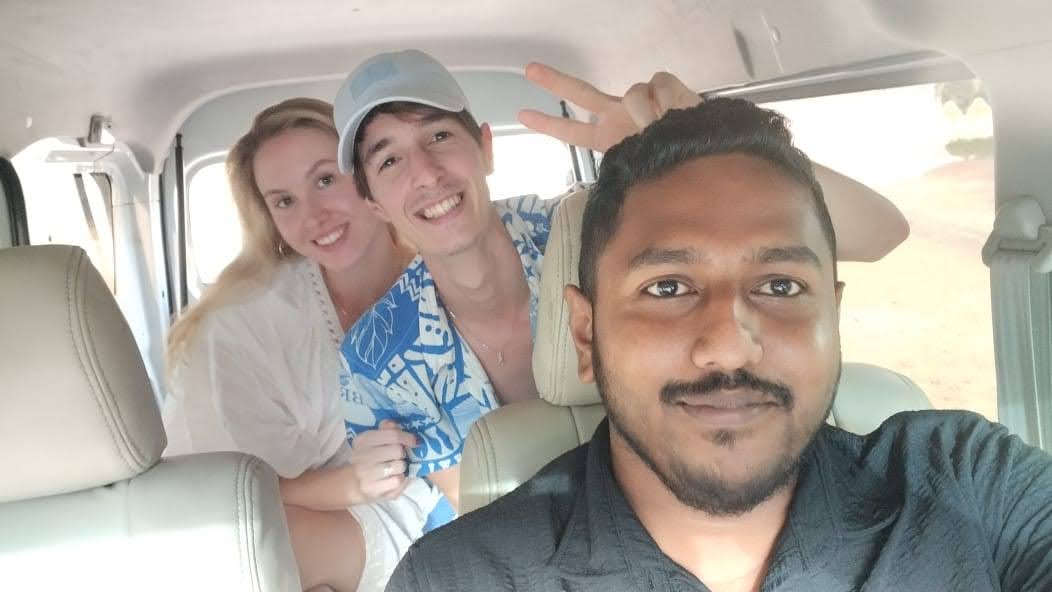 Young couple enjoying the road trip with our driver