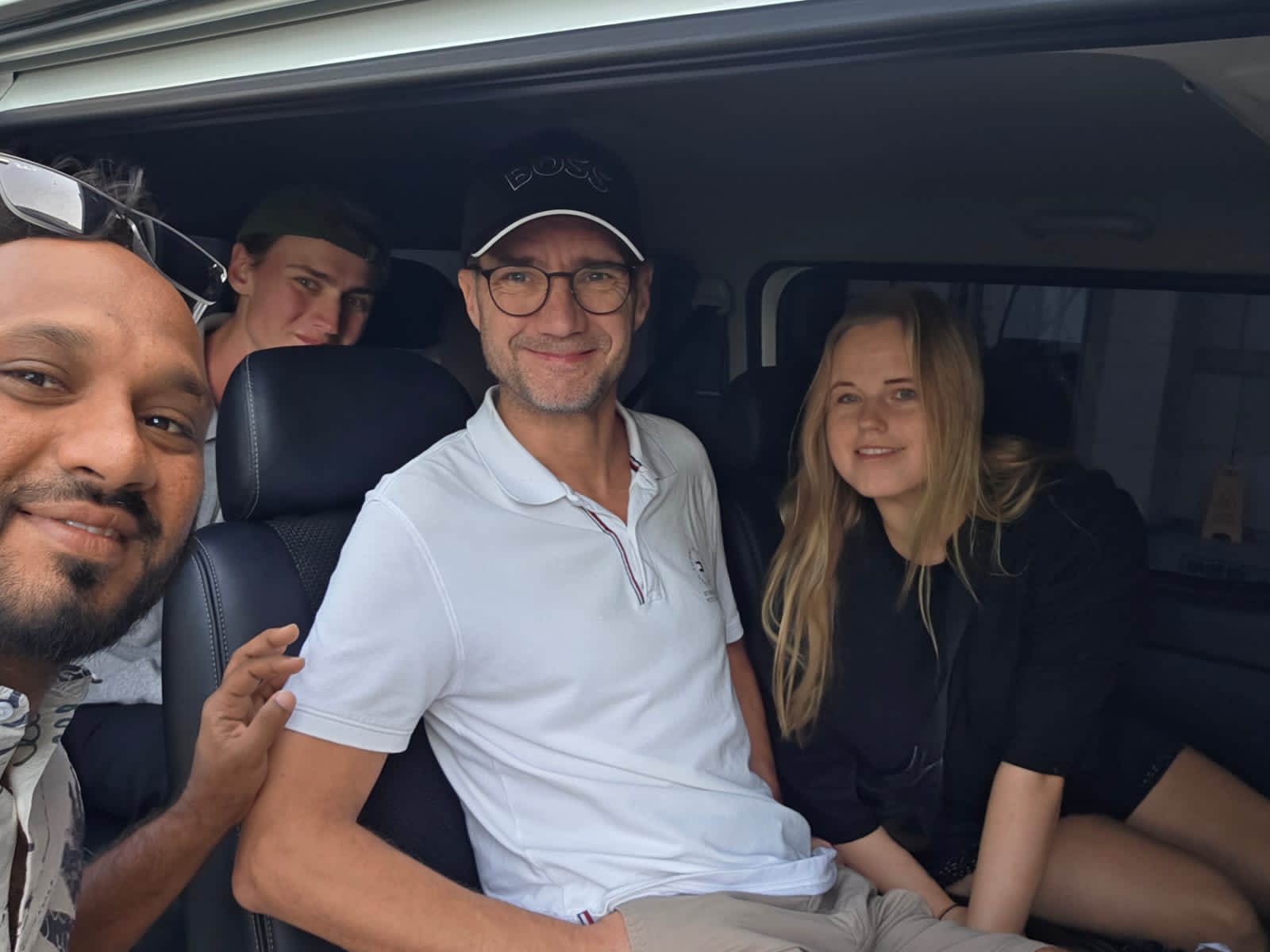 Family of three settled into the KDH van with our driver